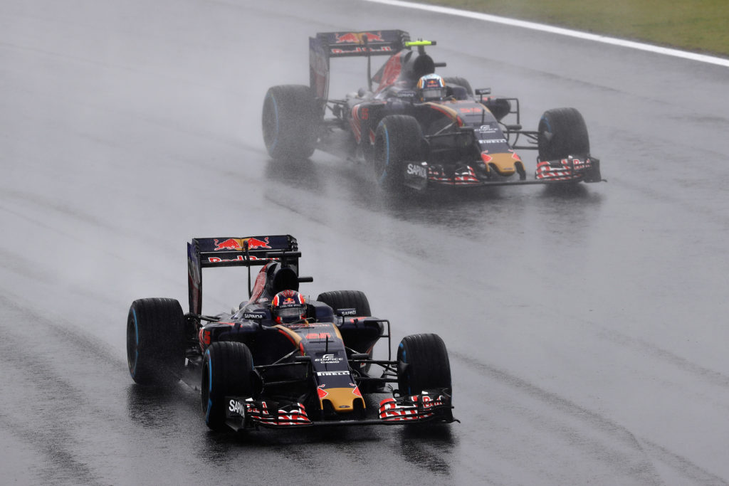 SAO PAULO, BRAZIL - NOVEMBER 13:  Daniil Kvyat of Russia driving the (26) Scuderia Toro Rosso STR11 Ferrari 060/5 turbo leads Carlos Sainz of Spain driving the (55) Scuderia Toro Rosso STR11 Ferrari 060/5 turbo on track during the Formula One Grand Prix of Brazil at Autodromo Jose Carlos Pace on November 13, 2016 in Sao Paulo, Brazil.  (Photo by Clive Mason/Getty Images)